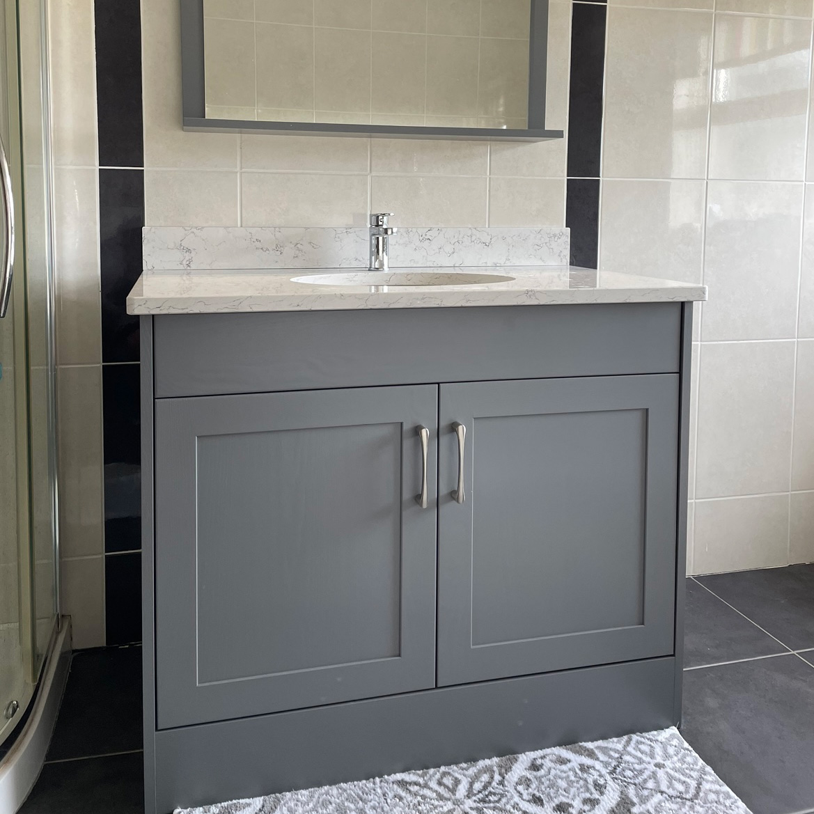 Custom built grey bathroom cabinet