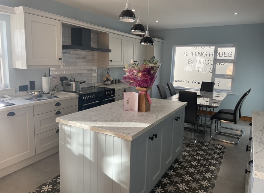 Grey and white Kitchen with breakfast island